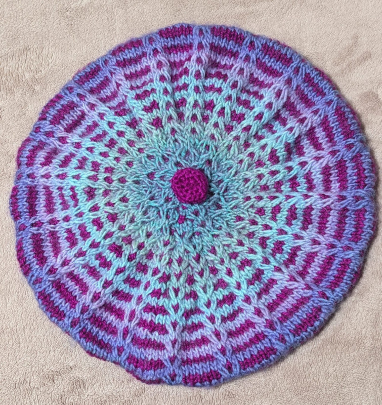 Mosaic knit beret top view flat